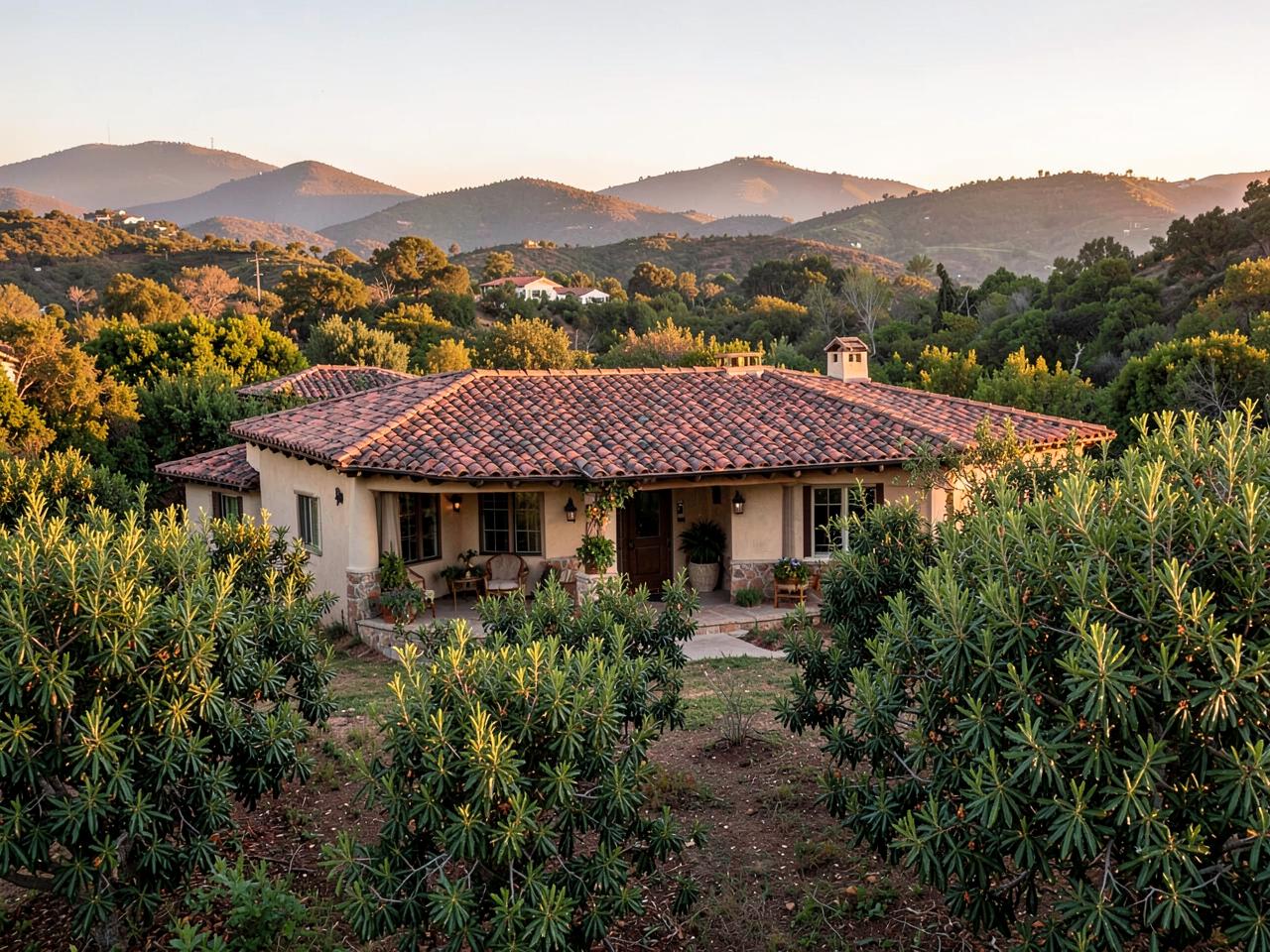Clay tile roof on a Fallbrook, CA hacienda-style home surrounded by avocado groves