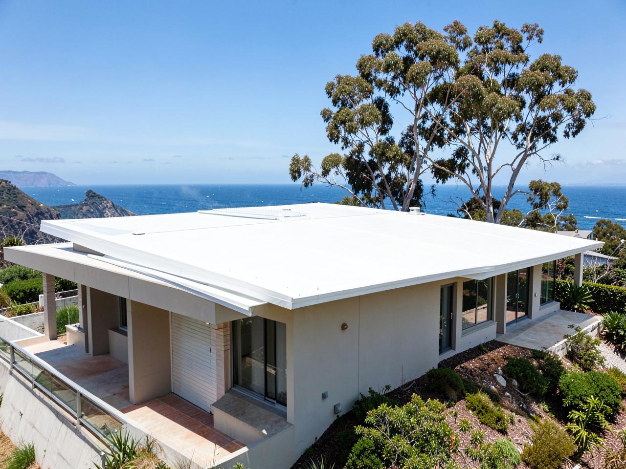 White TPO membrane and tile roof on a Solana Beach, CA bluff-top home